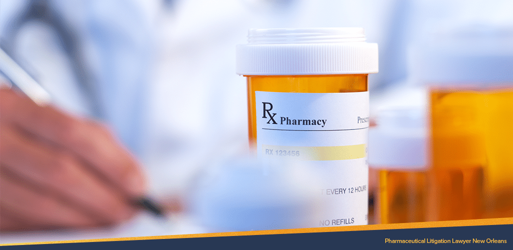 A pain killer bottle labeled with RC Pharmacy with an out of focus pharmaceutical lawyer filling up details on a paper around it