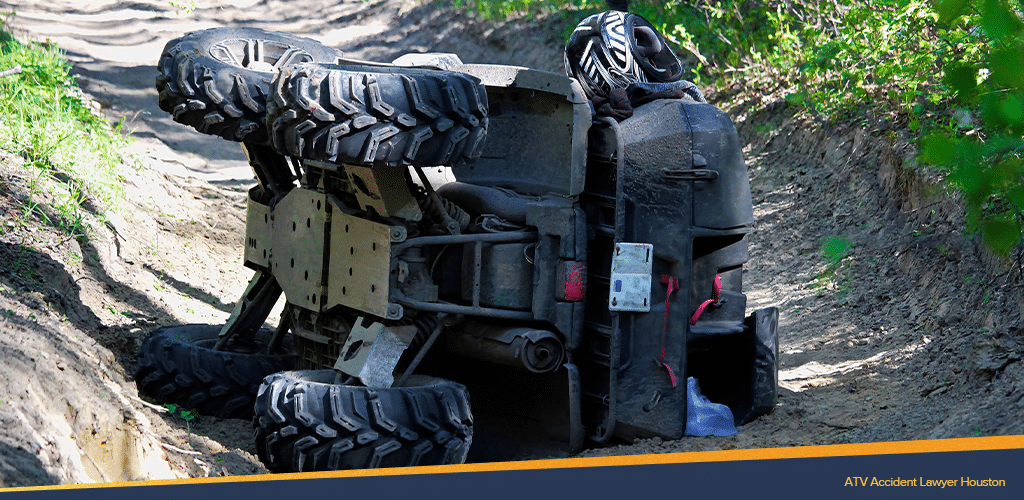 flipped ATV on a dirt road